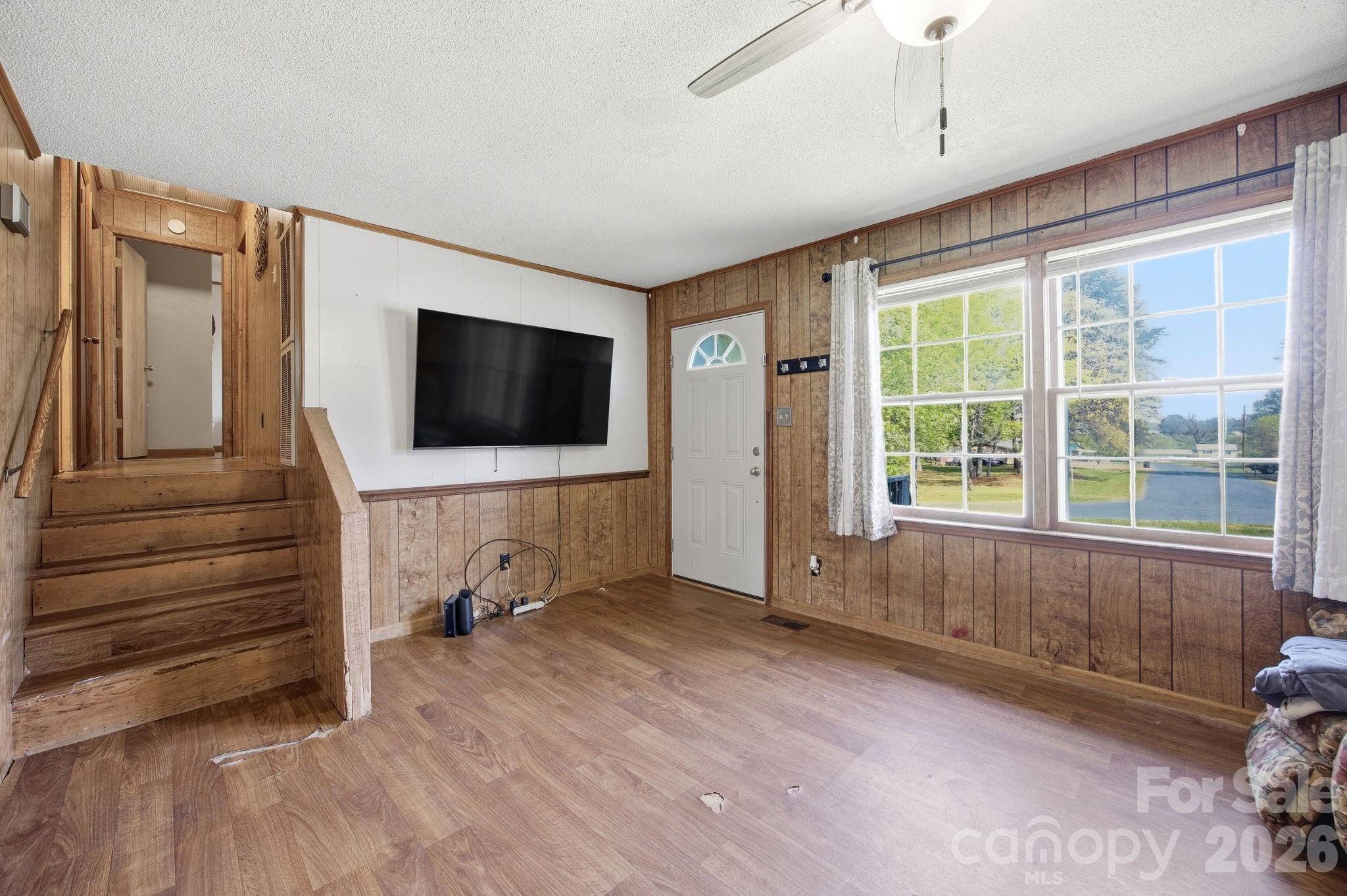 20 Ruby Street Rockwell, NC 28138 - Photo 11 of 38 a living room with furniture and a flat screen tv