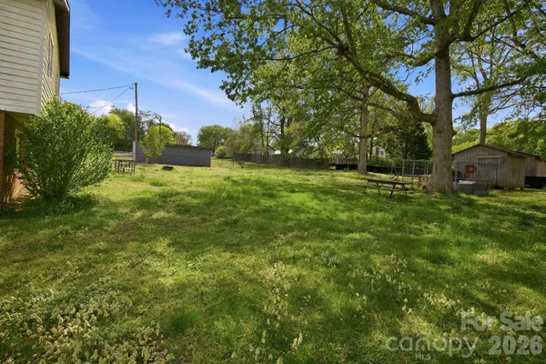 a aerial view of a house with a big yard