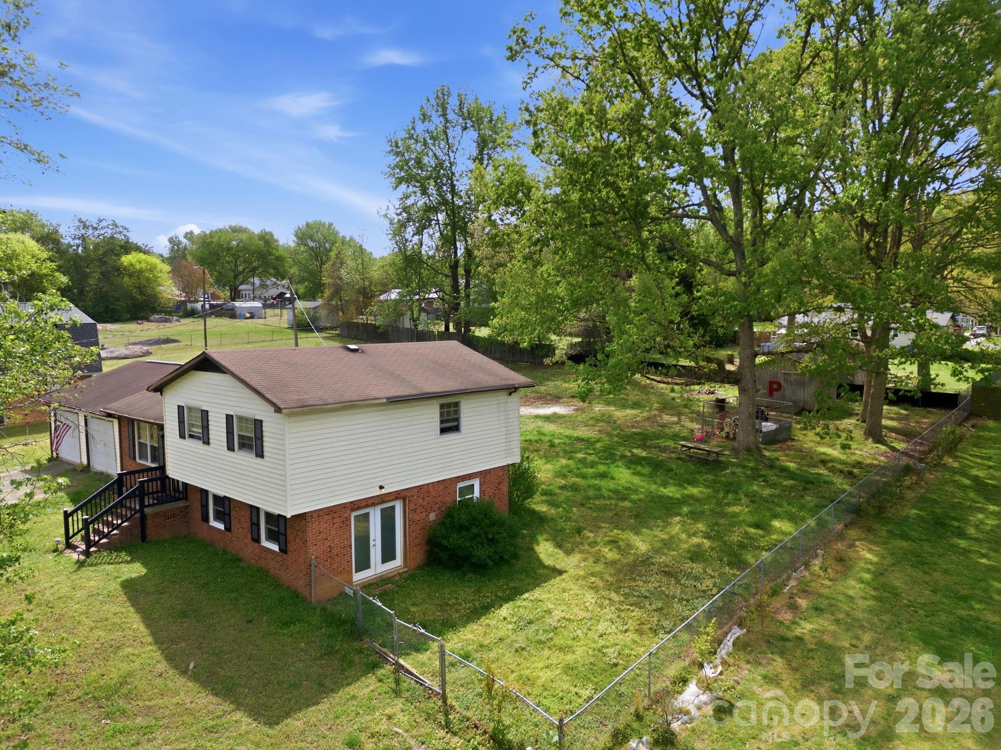 20 Ruby Street Rockwell, NC 28138 - Photo 32 of 38 a aerial view of a house with a big yard