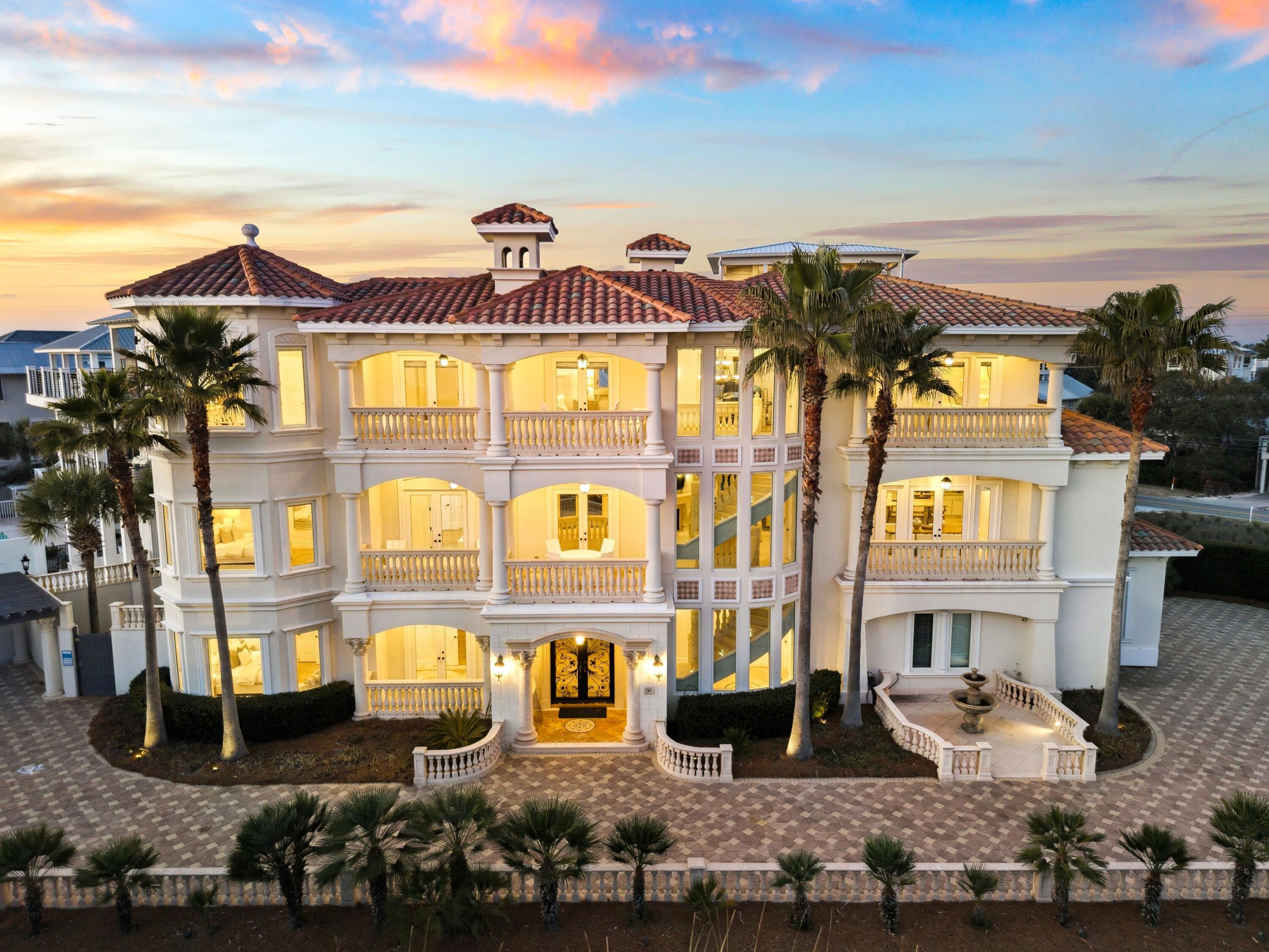 30 Pelican Circle Inlet Beach, FL 32461 - Photo 1 of 48 a front view of a residential apartment building with a yard