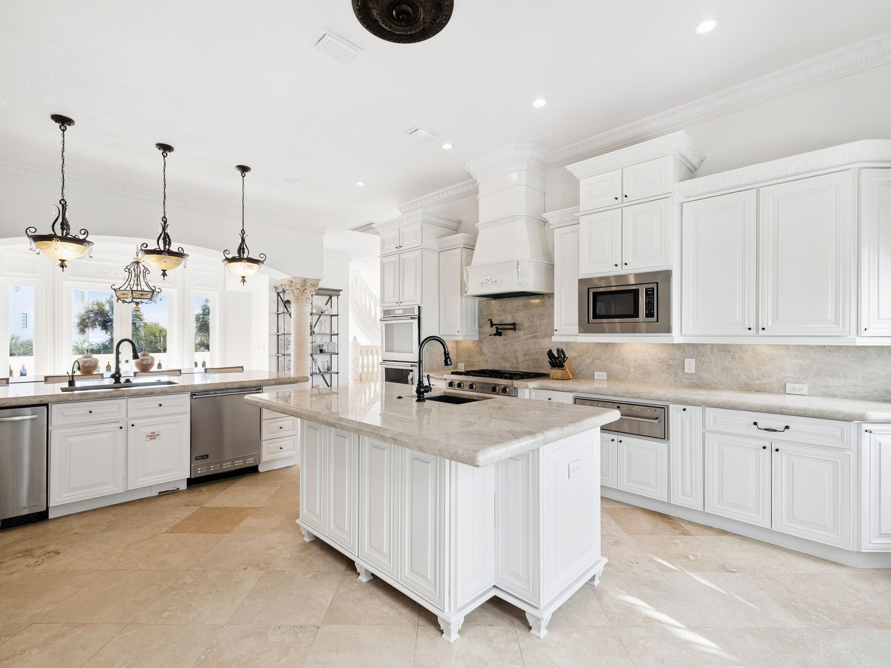 30 Pelican Circle Inlet Beach, FL 32461 - Photo 16 of 48 a kitchen with appliances a sink and cabinets
