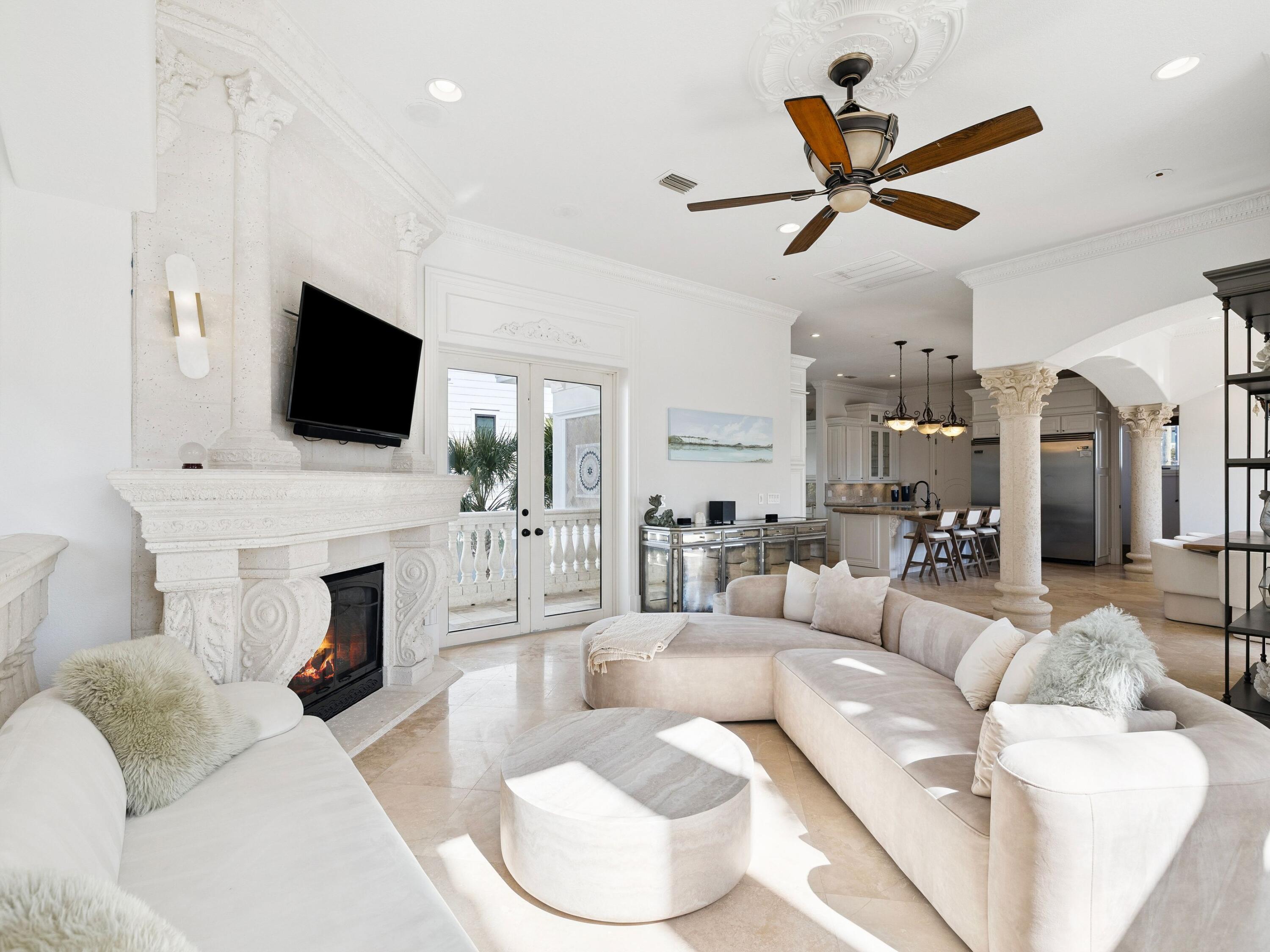 30 Pelican Circle Inlet Beach, FL 32461 - Photo 18 of 48 a living room with furniture a fireplace and a flat screen tv