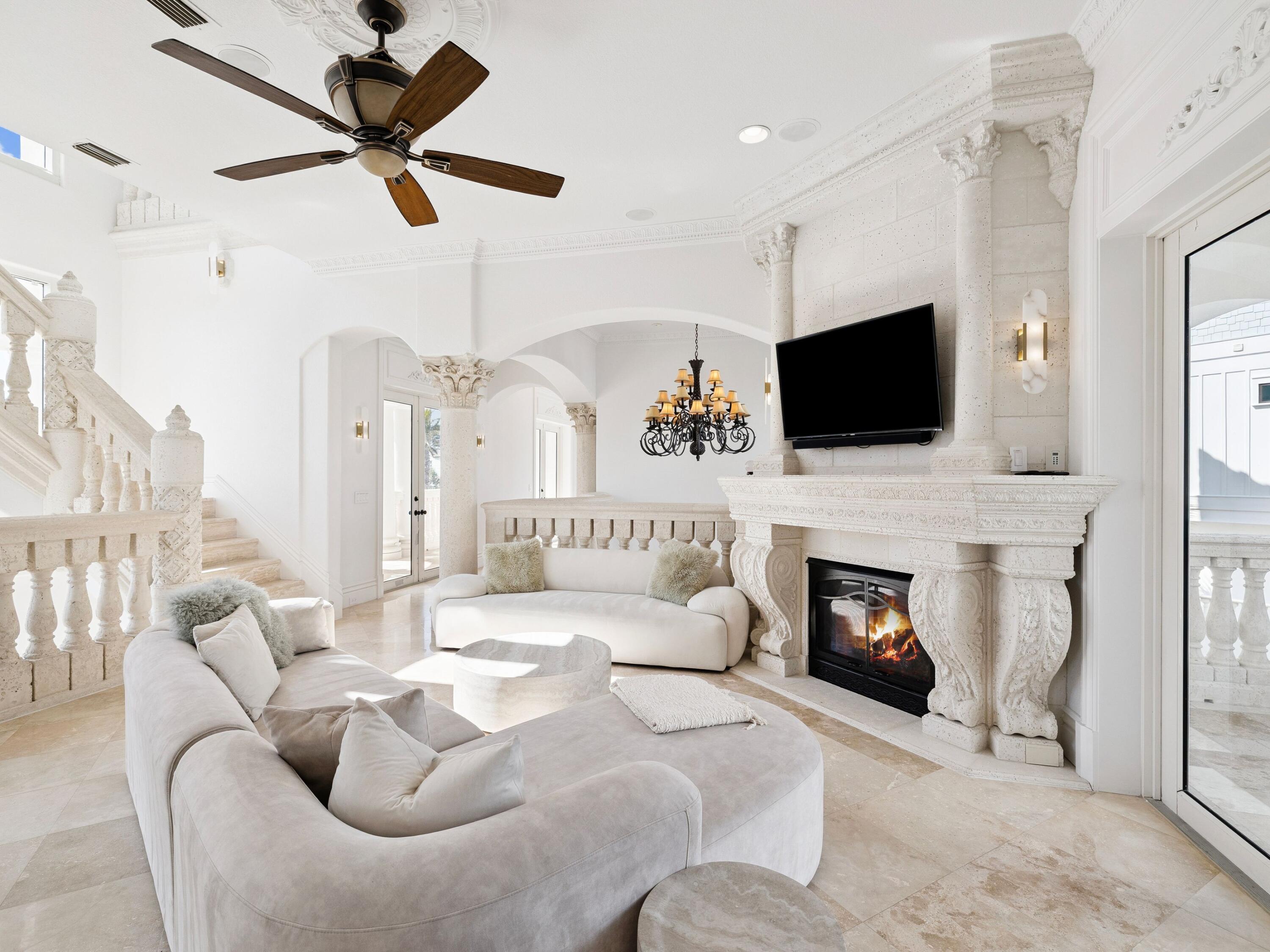 30 Pelican Circle Inlet Beach, FL 32461 - Photo 19 of 48 a living room with furniture a fireplace and a flat screen tv
