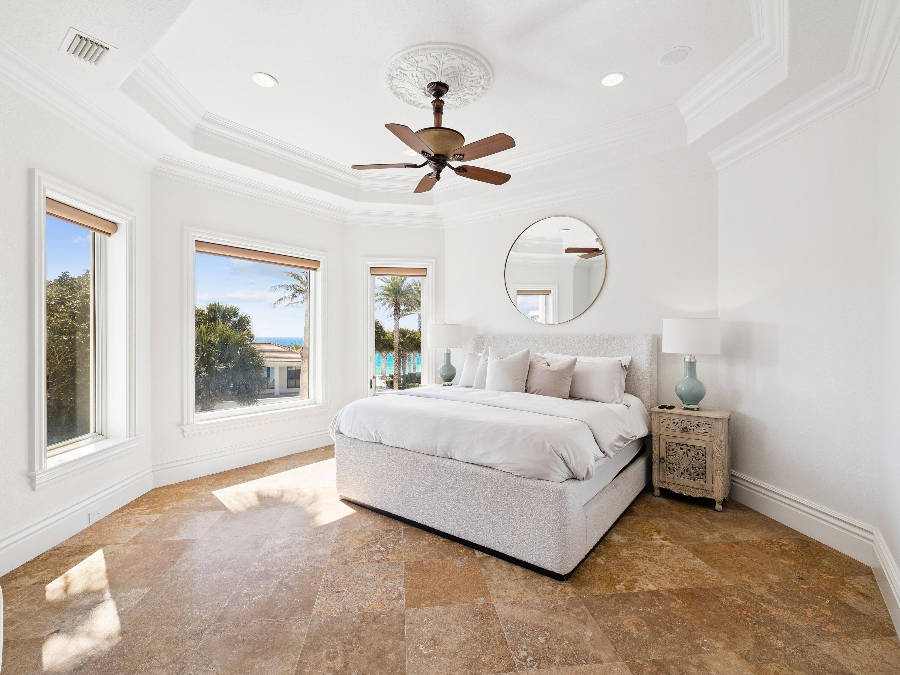 30 Pelican Circle Inlet Beach, FL 32461 - Photo 30 of 48 a living room with a bed furniture chandelier and a window