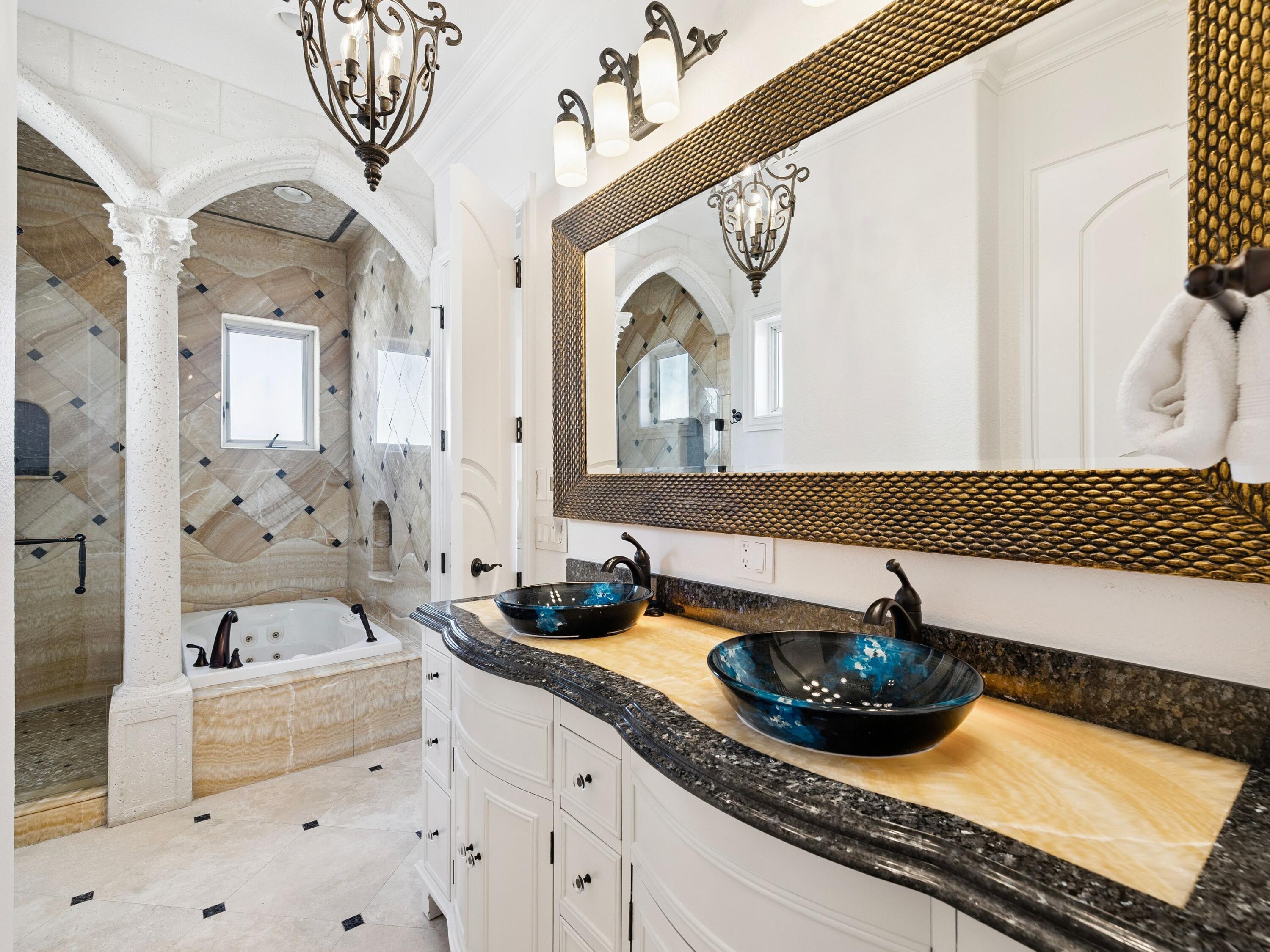 30 Pelican Circle Inlet Beach, FL 32461 - Photo 35 of 49 a bathroom with a granite countertop double vanity sink a mirror and bathtub