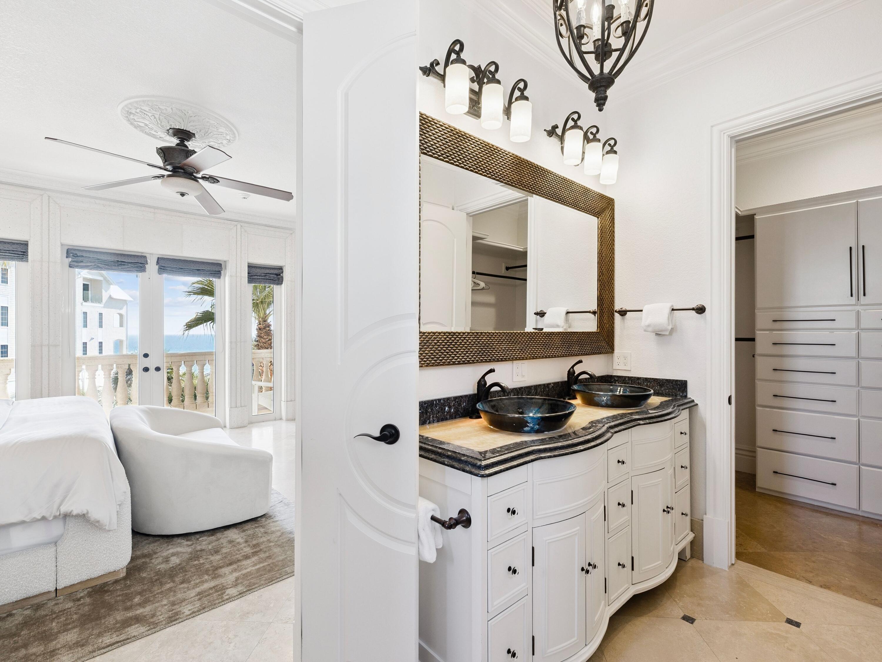 30 Pelican Circle Inlet Beach, FL 32461 - Photo 40 of 48 a bathroom with a double vanity sink a mirror and a shower