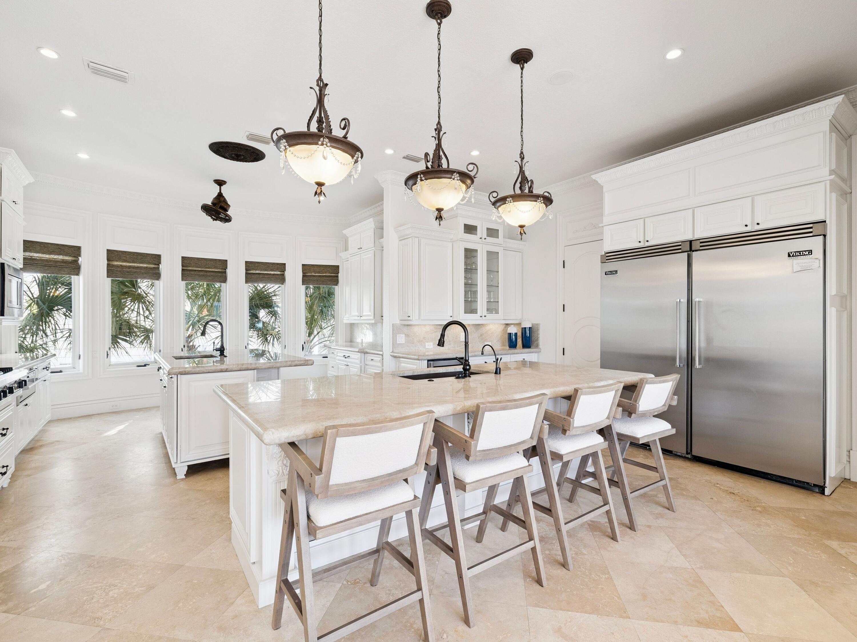 30 Pelican Circle Inlet Beach, FL 32461 - Photo 5 of 49 a large kitchen with a table and chairs