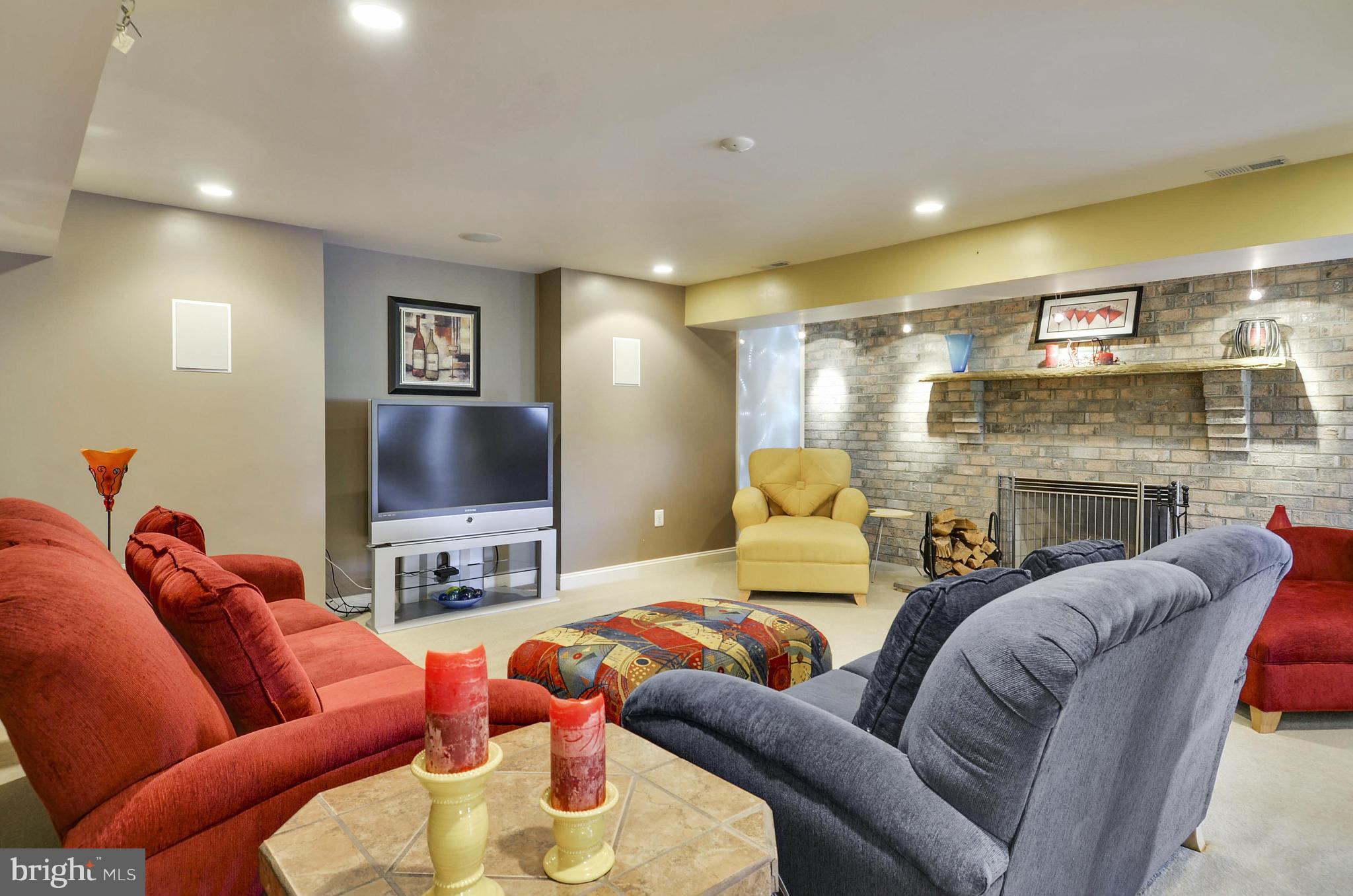 5006 South Renn Court Frederick, MD 21703 - Photo 20 of 30 a living room with furniture and a flat screen tv