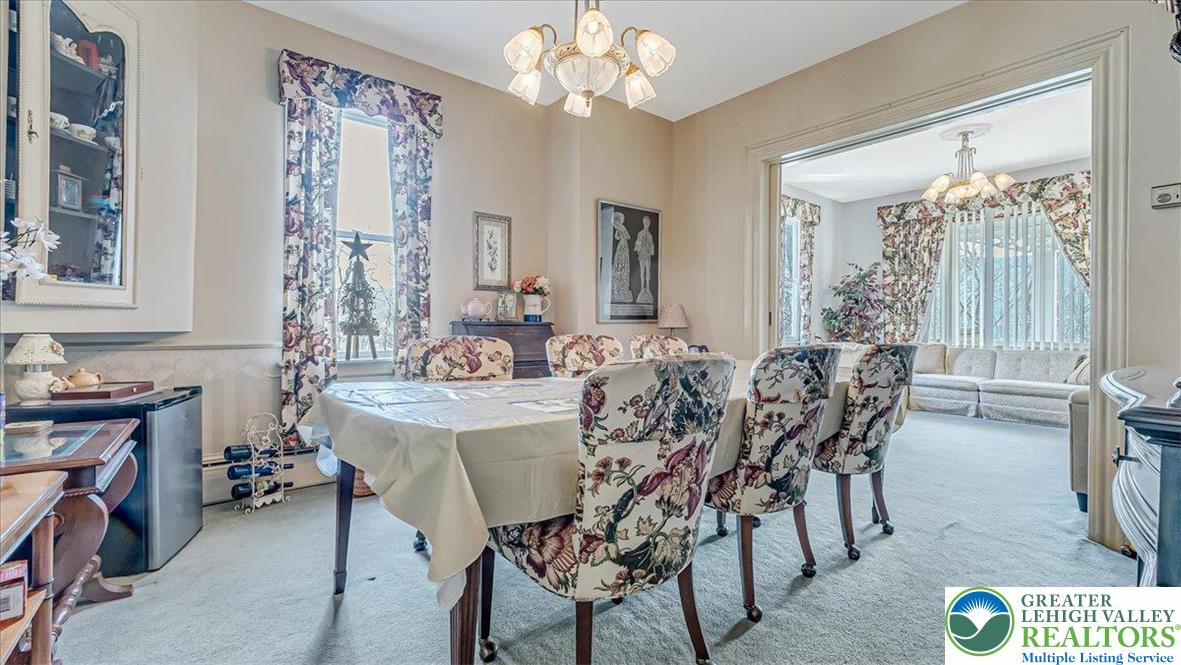 12 Chestnut Avenue Jim Thorpe, PA 18229 - Photo 11 of 38 a view of a dining room with furniture and chandelier