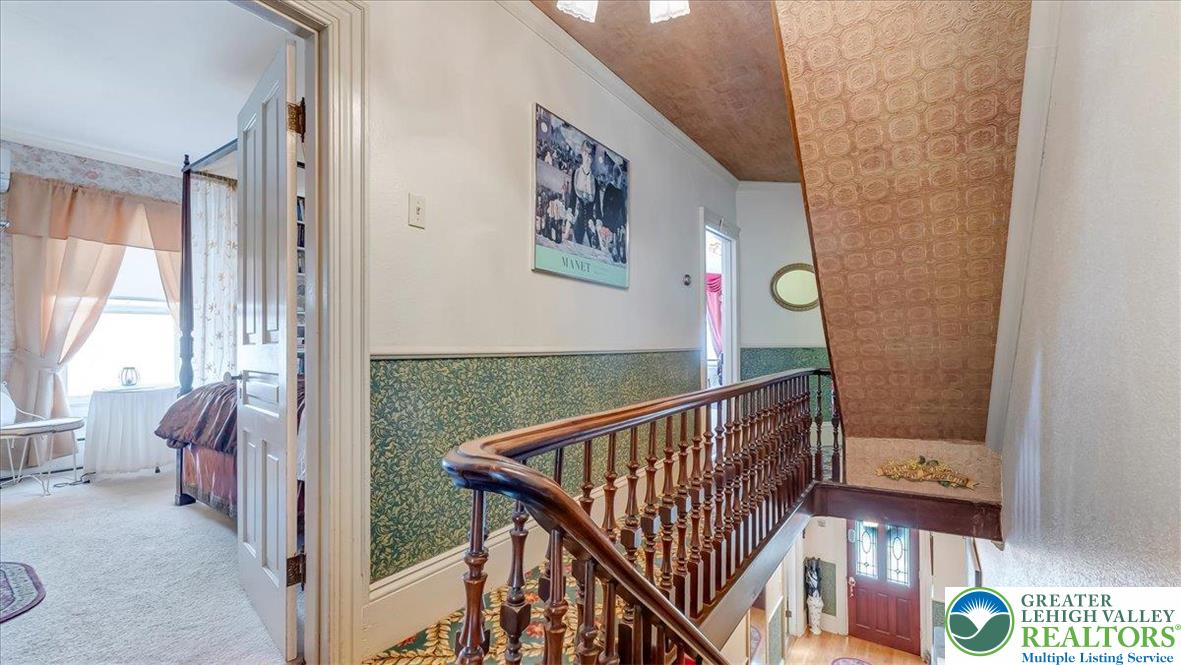 12 Chestnut Avenue Jim Thorpe, PA 18229 - Photo 15 of 38 a view of a hallway with furniture and windows