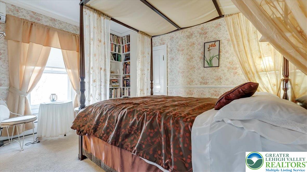 12 Chestnut Avenue Jim Thorpe, PA 18229 - Photo 20 of 38 a bedroom with a bed and a large window