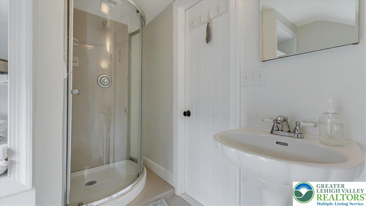12 Chestnut Avenue Jim Thorpe, PA 18229 - Photo 24 of 38 a bathroom with a shower and a sink