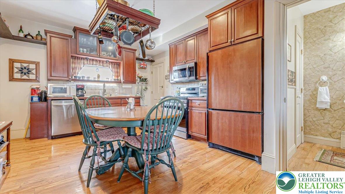 12 Chestnut Avenue Jim Thorpe, PA 18229 - Photo 4 of 38 a view of a dining room with furniture and wooden floor