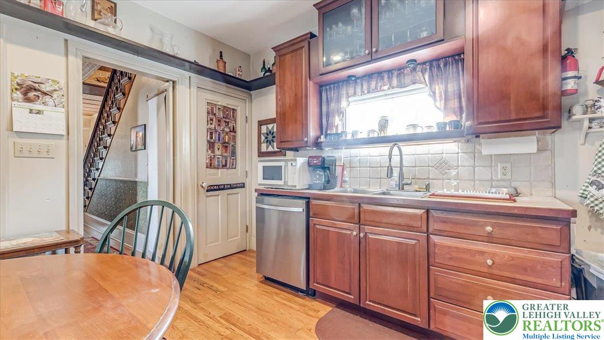 12 Chestnut Avenue Jim Thorpe, PA 18229 - Photo 5 of 38 a kitchen with stainless steel appliances granite countertop a sink and a window