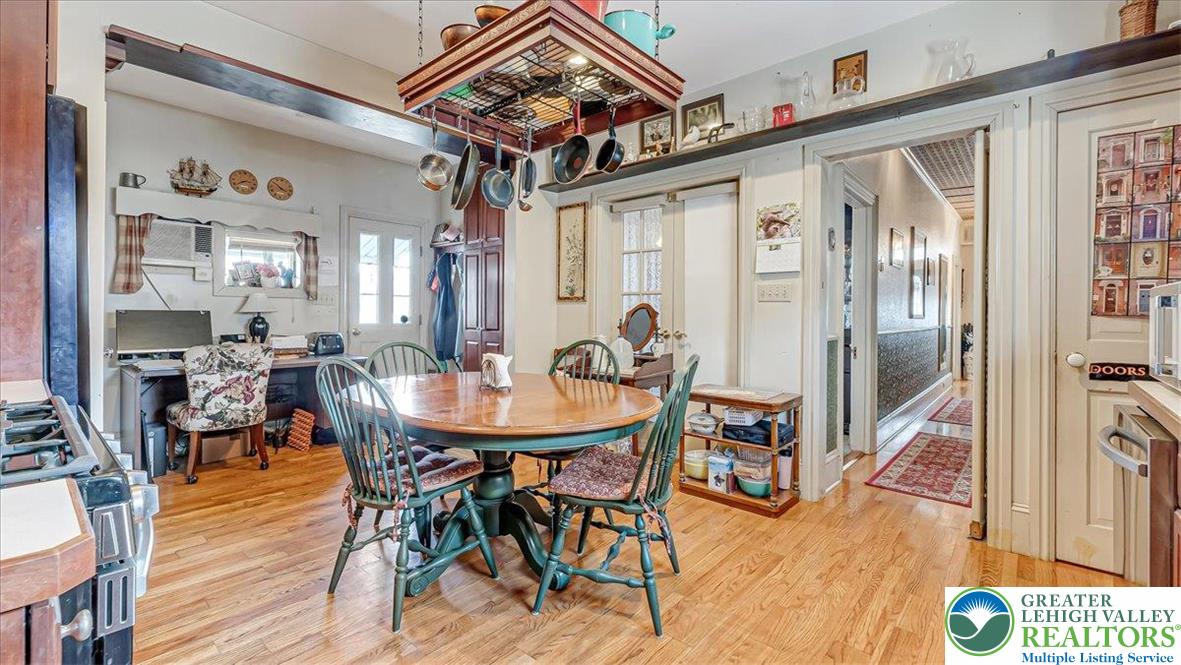 12 Chestnut Avenue Jim Thorpe, PA 18229 - Photo 7 of 38 a view of a dining room with furniture and wooden floor