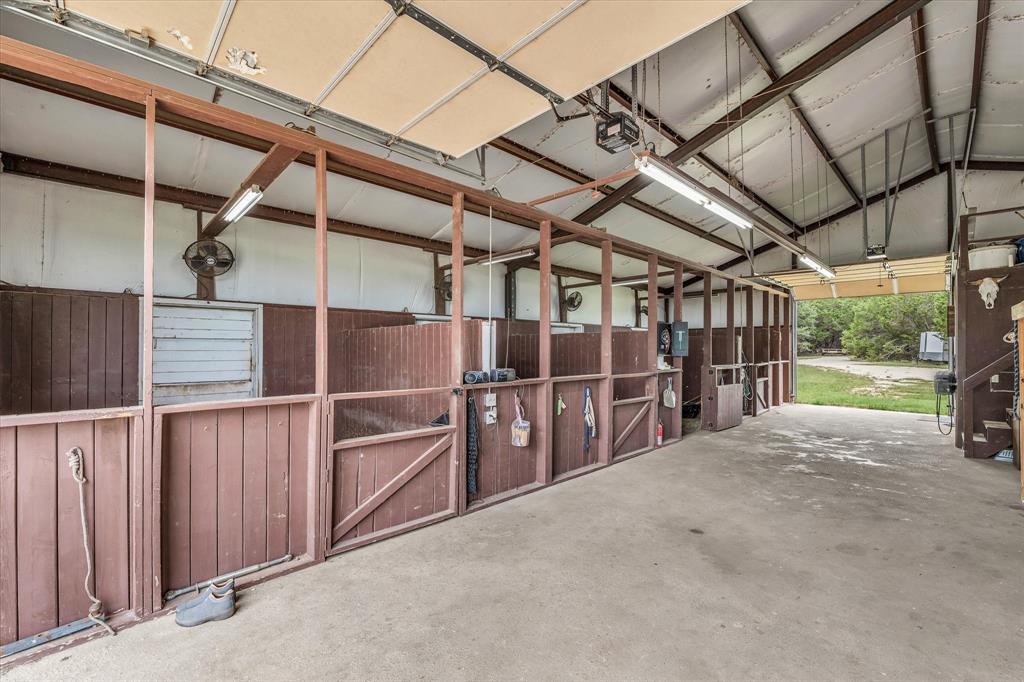 613 Bone Road Valley Mills, TX 76689 - Photo 35 of 40 a view of a garage with wooden walls