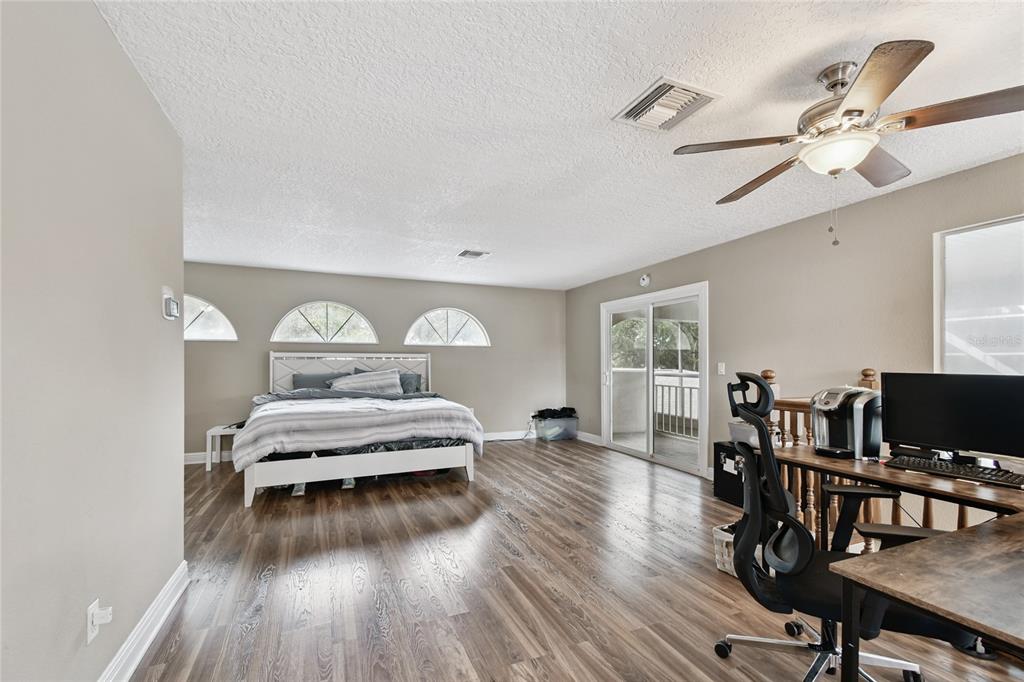 1948 Belleair Road Clearwater, FL 33764 - Photo 61 of 84 a view of a livingroom with furniture window and wooden floor