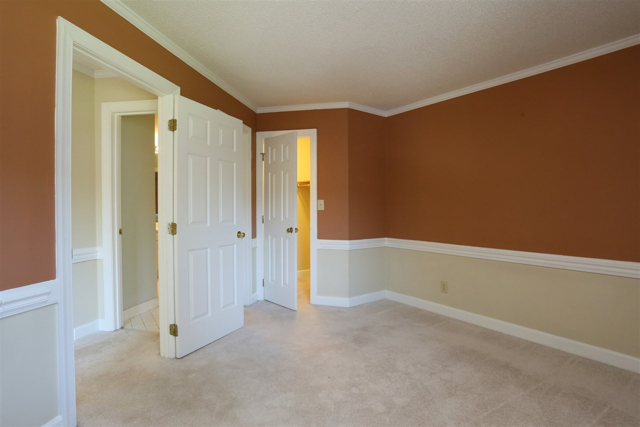 7040 Sandy Forks Road, Unit 201 Raleigh, NC 27609 - Photo 7 of 29 First floor guest room with full bath can be used as master bedroom First Floor Guest Room