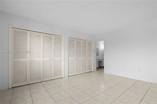 an empty room with a bathroom