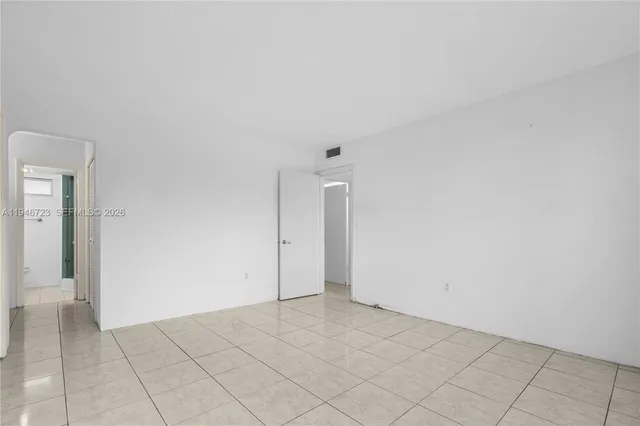 an empty room with an entryway