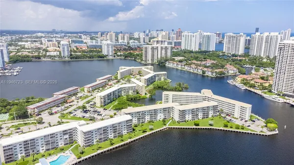 a view of a city with an ocean