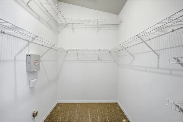 a view of a room with racks on the wall