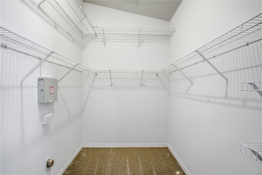 1417 Sedgwick Drive Wesley Chapel, FL 33543 - Photo 14 of 22 a view of a room with racks on the wall