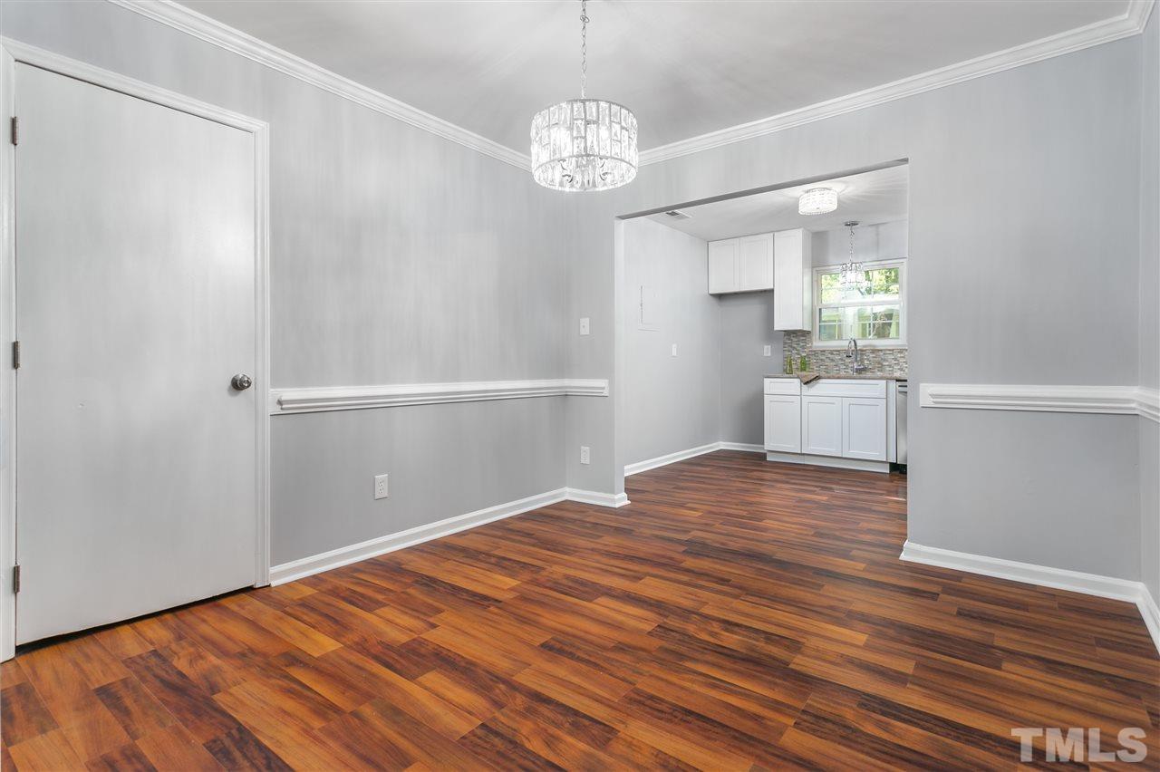 6453 New Market Way, Unit 6453 Raleigh, NC 27615 - Photo 14 of 30 Dining room can accommodate a large table and accessories for entertaining!