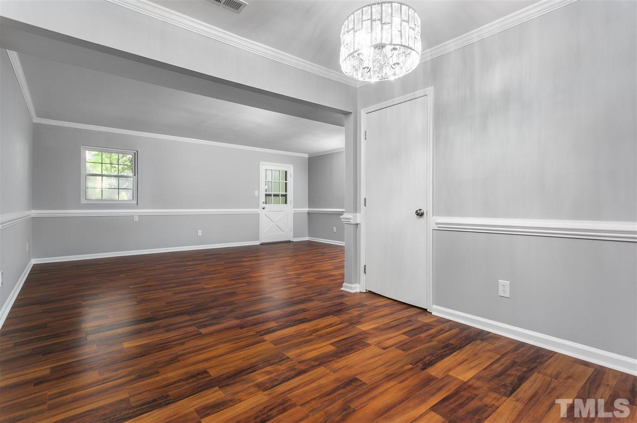 6453 New Market Way, Unit 6453 Raleigh, NC 27615 - Photo 15 of 30 The new laminate flooring is durable and makes clean up a breeze!