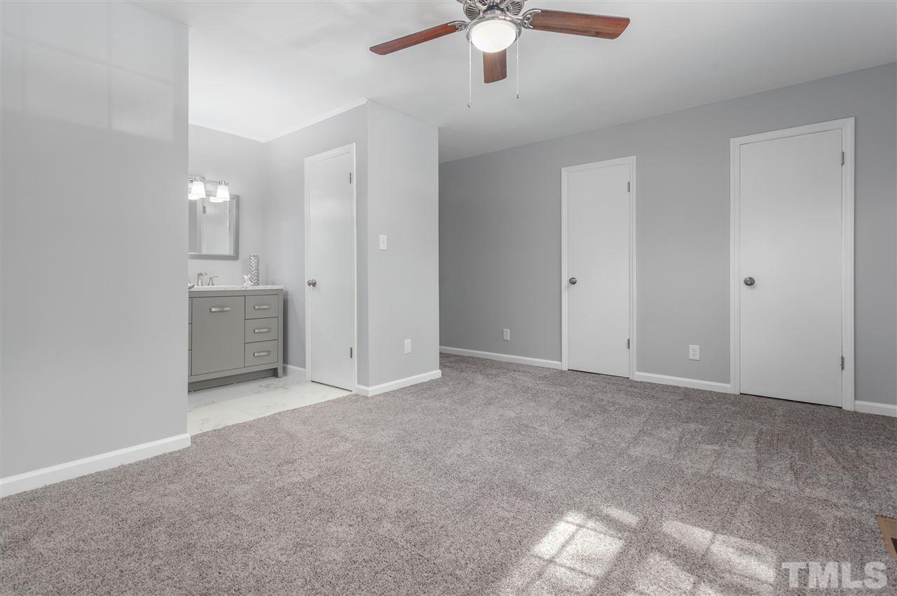 6453 New Market Way, Unit 6453 Raleigh, NC 27615 - Photo 22 of 30 The large master bedroom comes complete with his and hers closets!