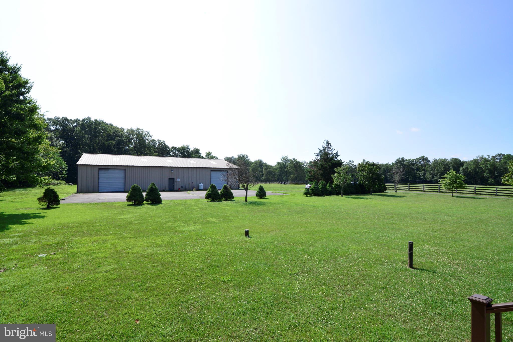 43157 Lucketts Road Leesburg, VA 20176 - Photo 35 of 56 View of large metal building from rear of home