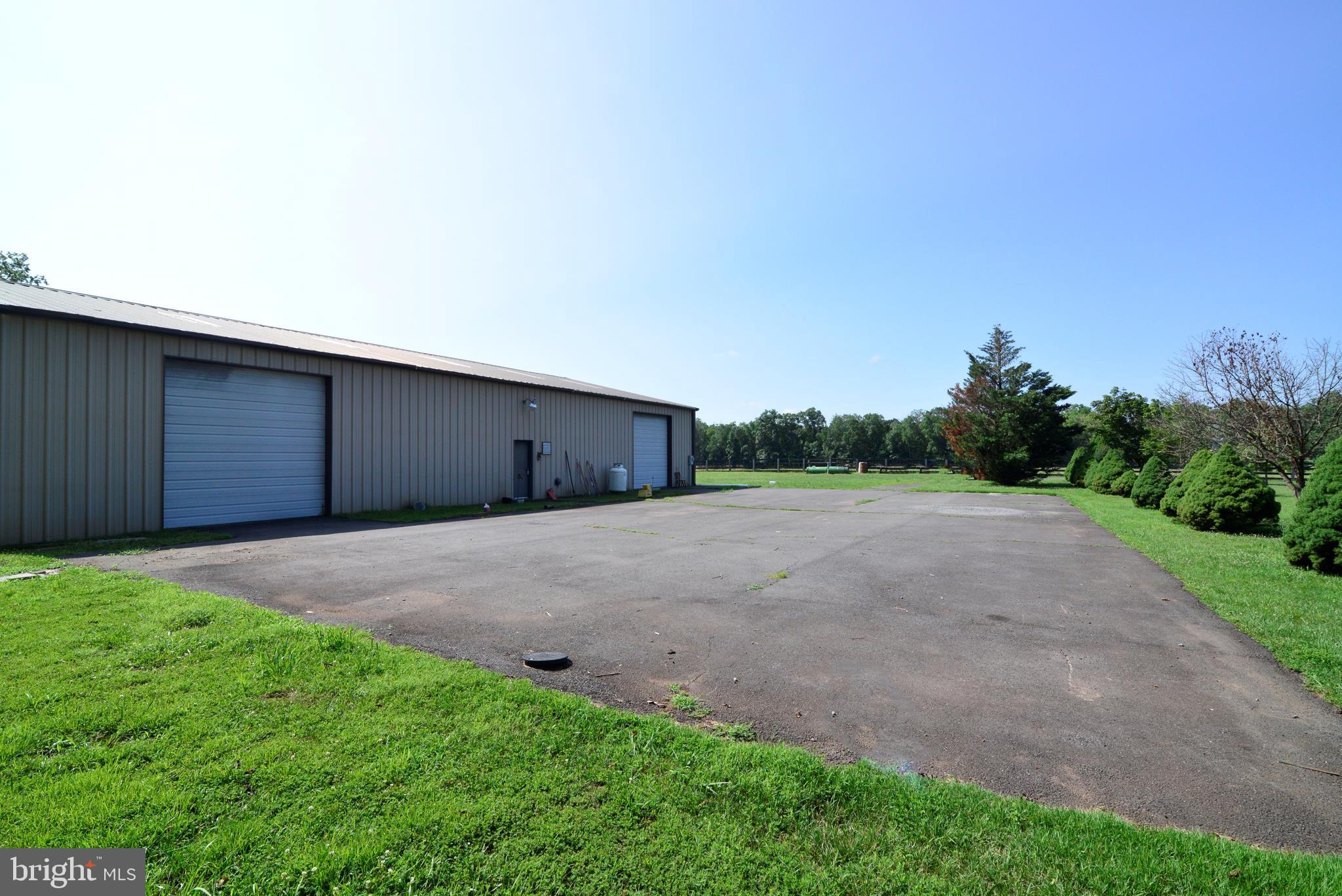 43157 Lucketts Road Leesburg, VA 20176 - Photo 36 of 56 Two large overhead doors and paved parking area