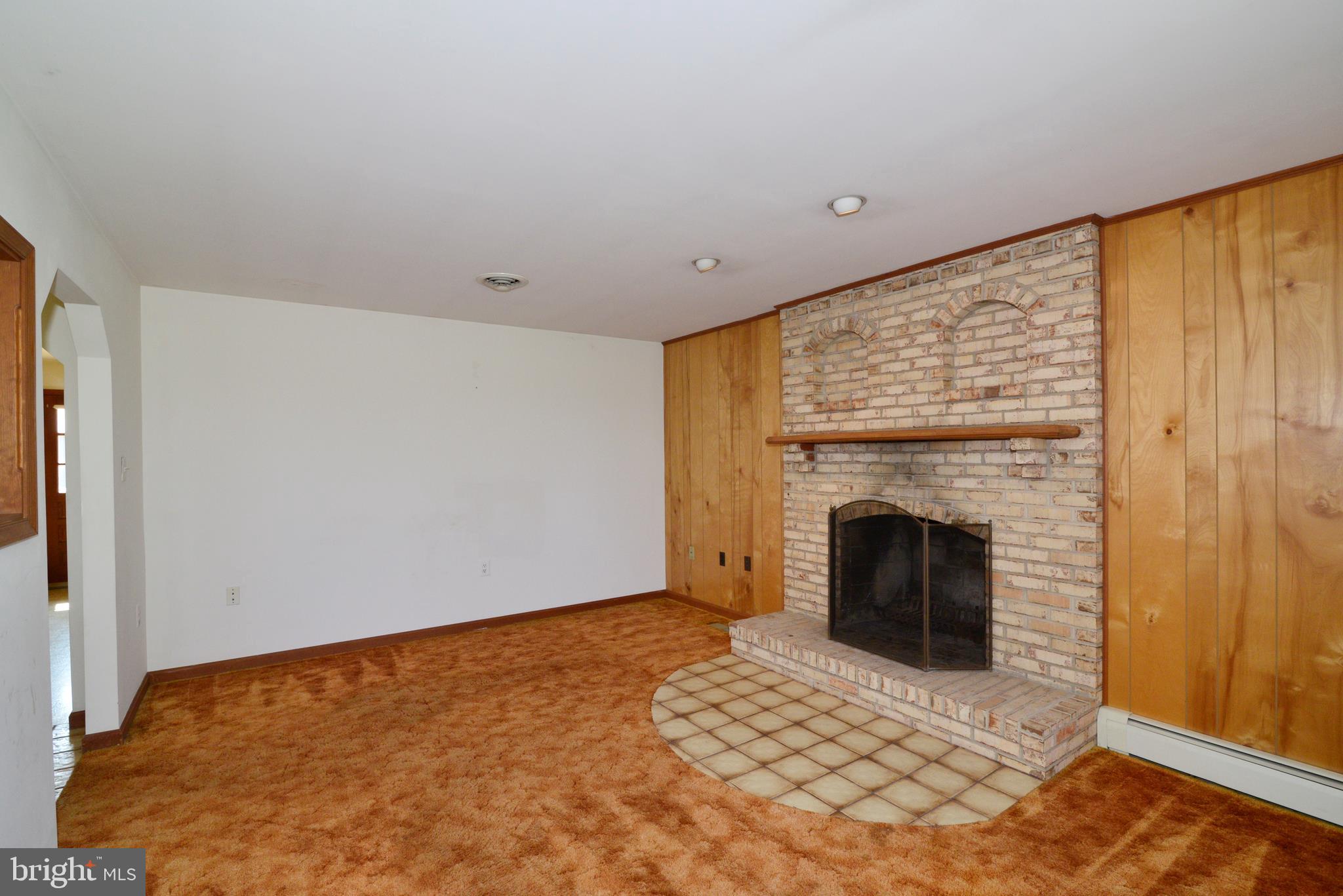 43157 Lucketts Road Leesburg, VA 20176 - Photo 10 of 56 Fireplace with brick hearth and mantel