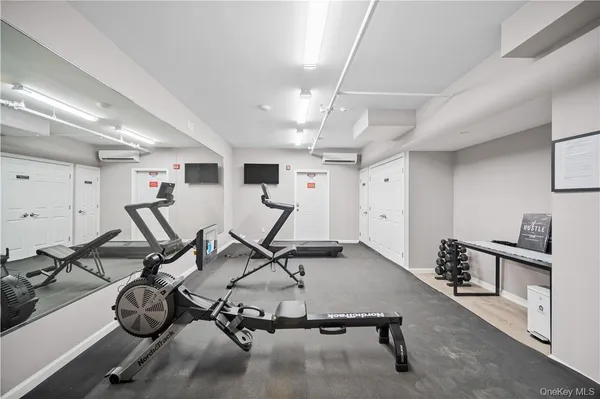 a view of a room with gym equipment