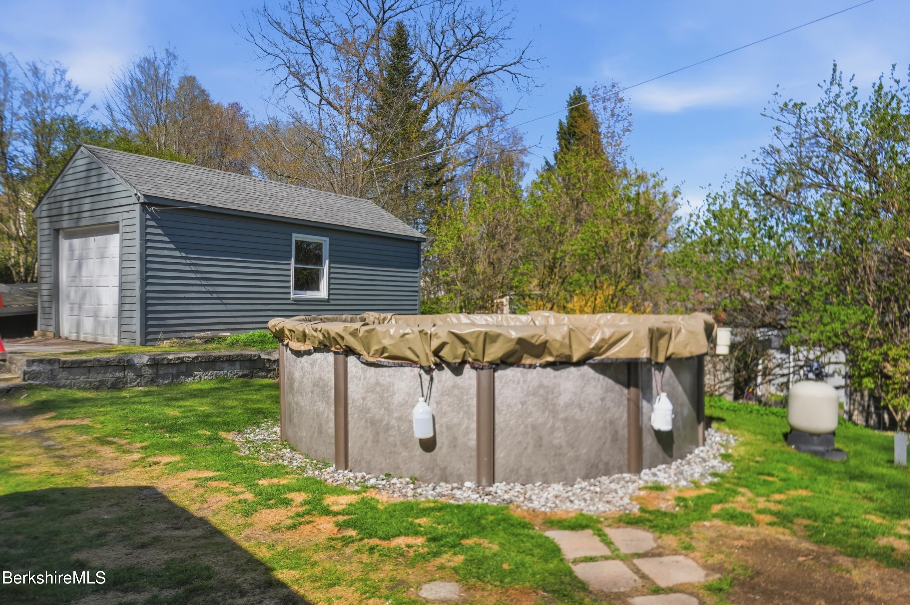 22 Broadway Street Pittsfield, MA 01201 - Photo 75 of 84 a view of a house with backyard and sitting area