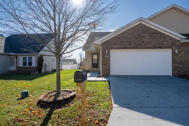 a view of a house with backyard