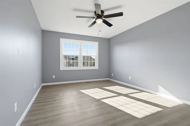 a bathroom with a sink vanity and a mirror