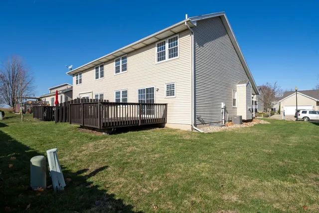 a view of backyard with deck