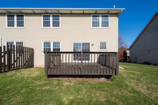a bedroom with a bed and a table