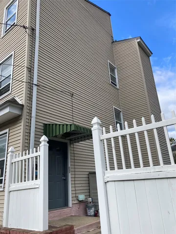 a view of a house with a deck
