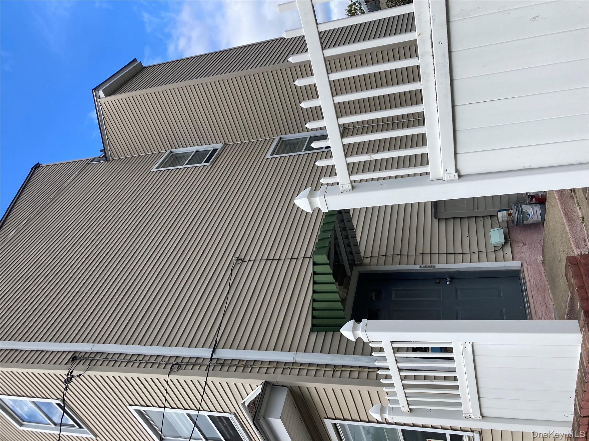 a view of a house with a deck