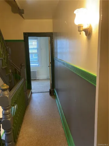 a view of hallway with stairs