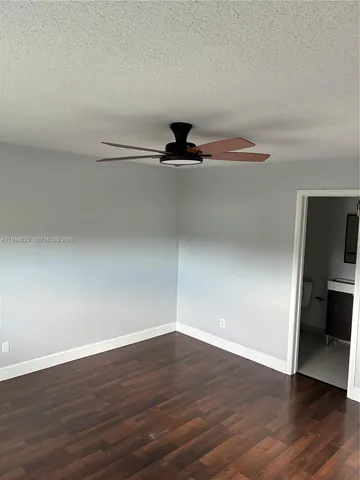 a view of a livingroom with wooden floor