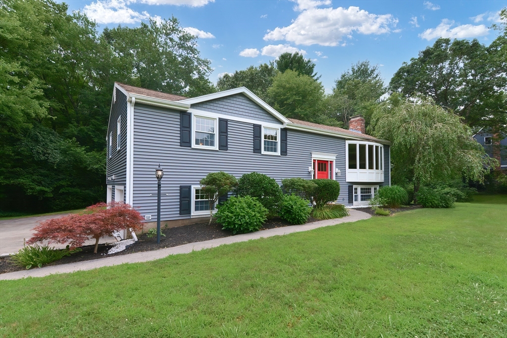 18 Green Valley Road Medway, MA 02053 - Photo 5 of 42 a front view of house with yard and green space
