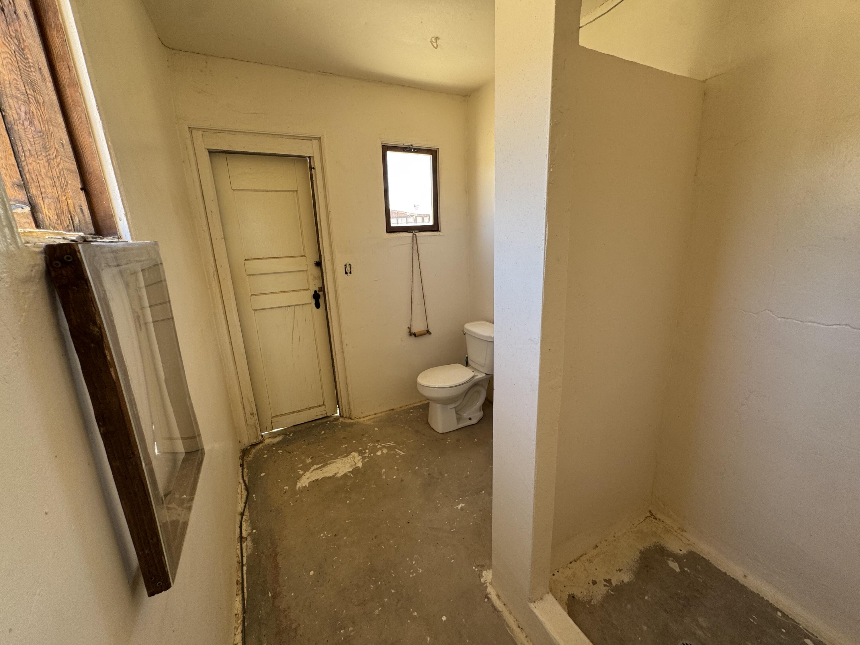 73392 Sullivan Road Twentynine Palms, CA 92277 - Photo 16 of 29 a bathroom with a granite countertop sink and a mirror