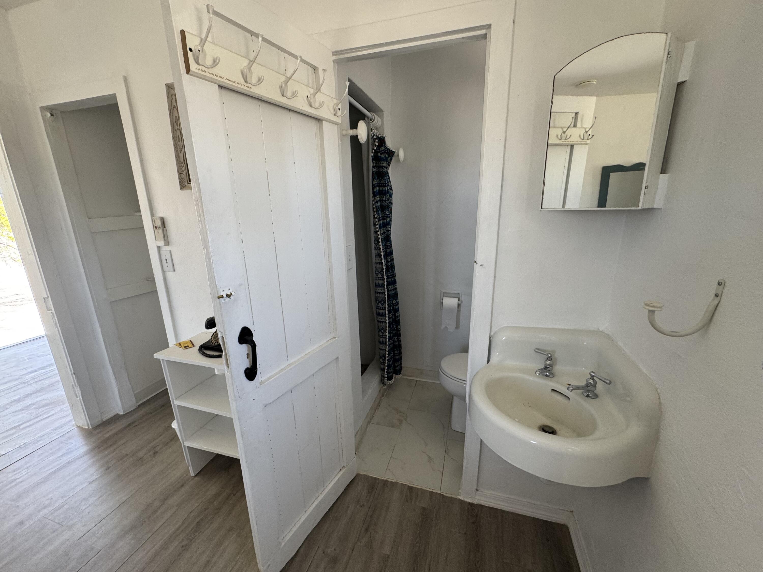 73392 Sullivan Road Twentynine Palms, CA 92277 - Photo 23 of 29 a bathroom with a sink a window and tub