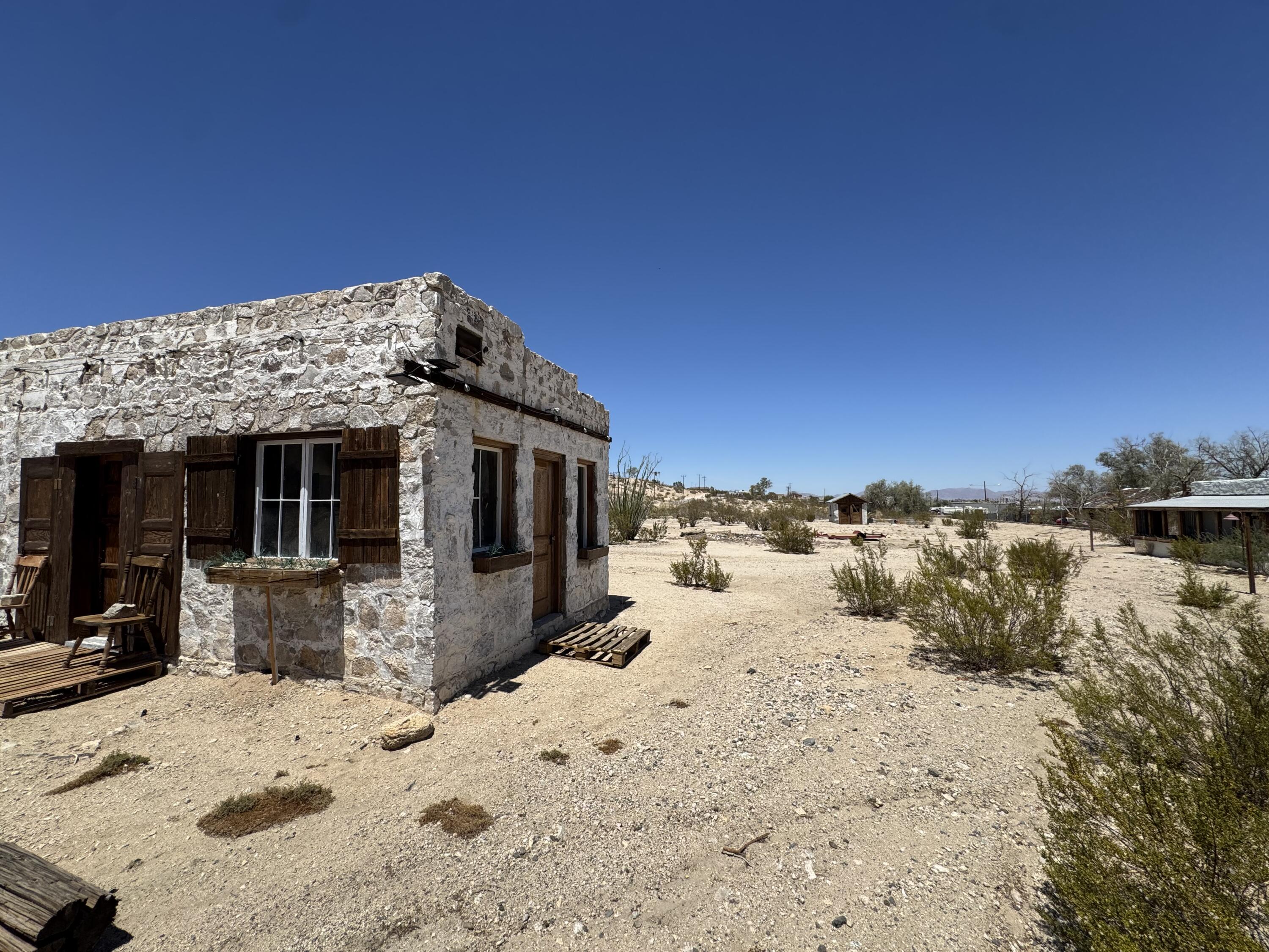 73392 Sullivan Road Twentynine Palms, CA 92277 - Photo 29 of 29 a view of a lounge chair on the beach