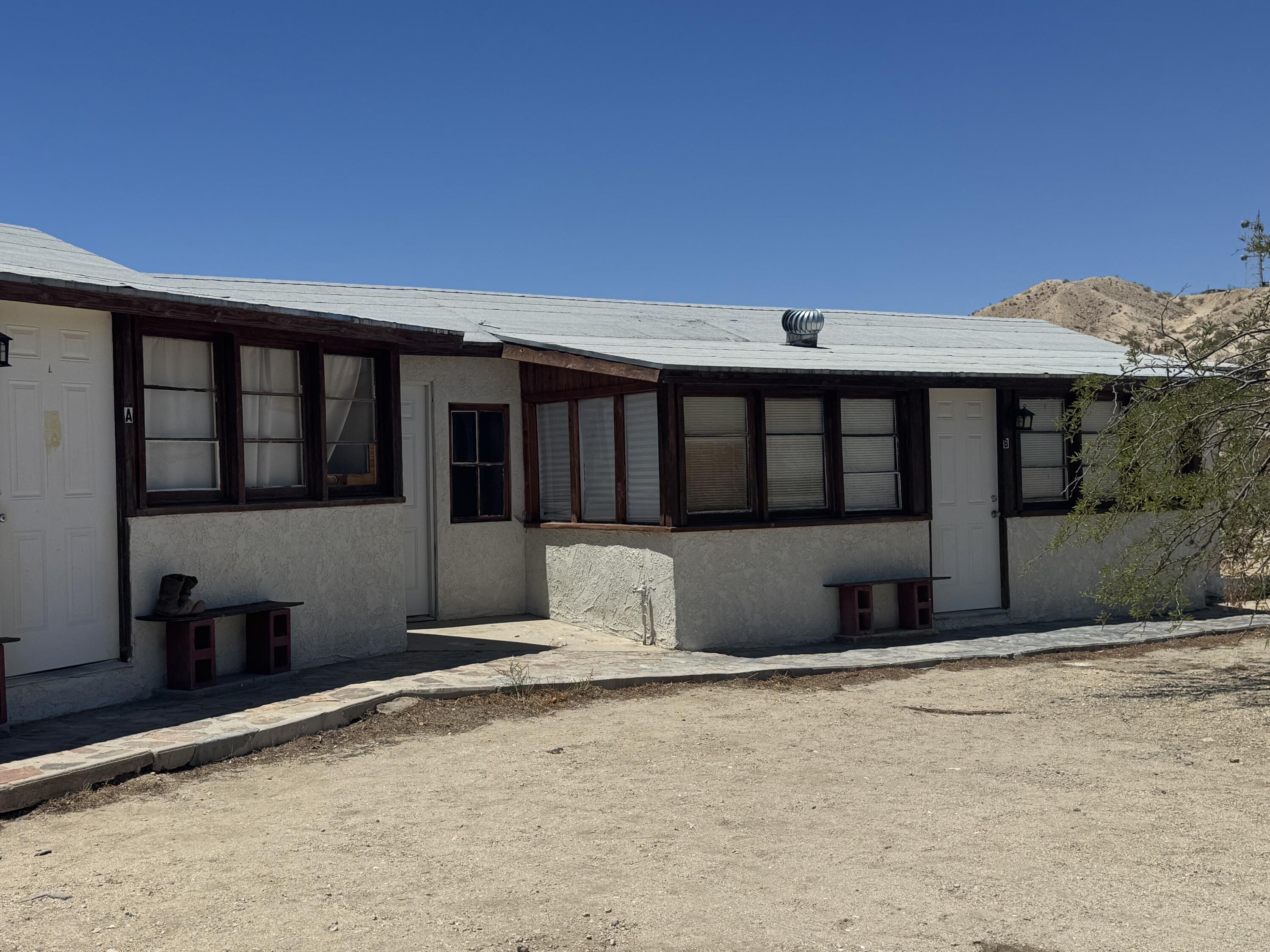 73392 Sullivan Road Twentynine Palms, CA 92277 - Photo 9 of 29 a front view of a house