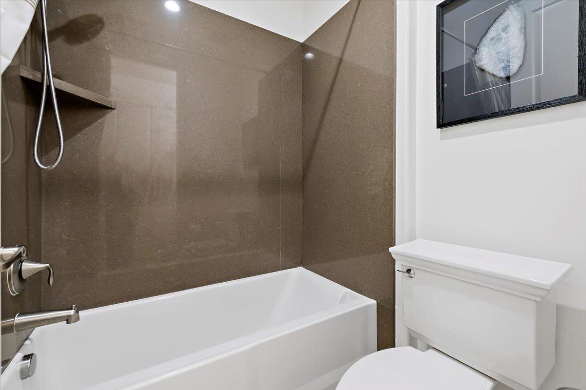 3003 Marcelli Circle Los Altos, CA 94022 - Photo 13 of 21 a bathroom with a toilet and white tub