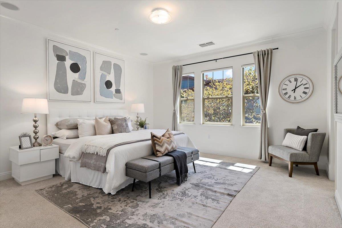 3003 Marcelli Circle Los Altos, CA 94022 - Photo 16 of 21 a spacious bedroom with a bed and a window